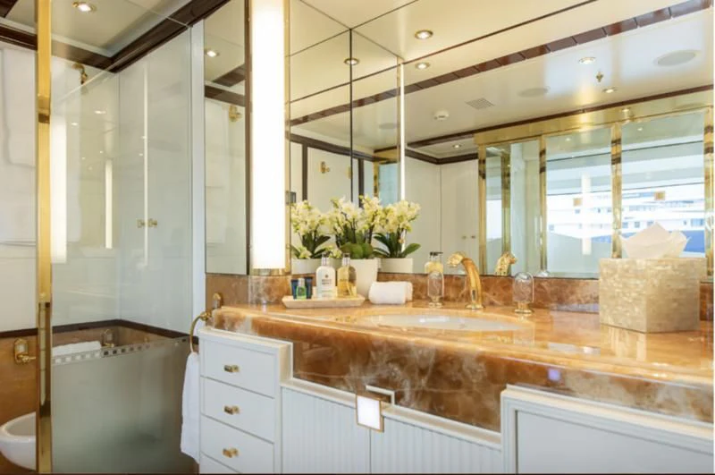a bathroom with a large mirror aboard JAGUAR Yacht for Charter