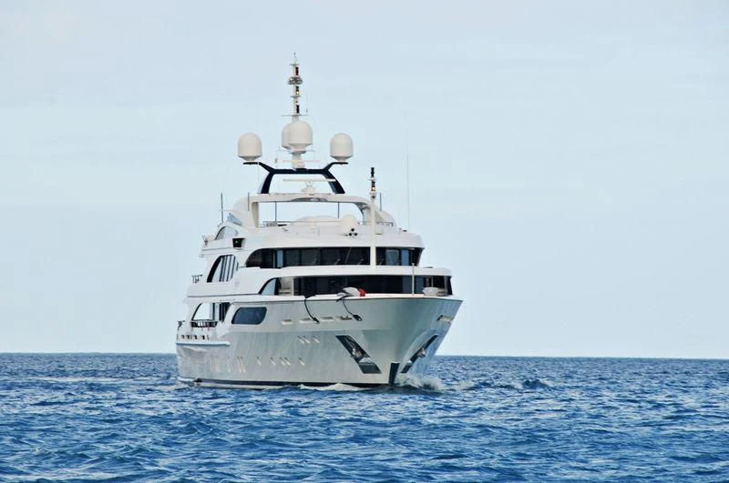 a white boat in the water aboard JAGUAR Yacht for Charter