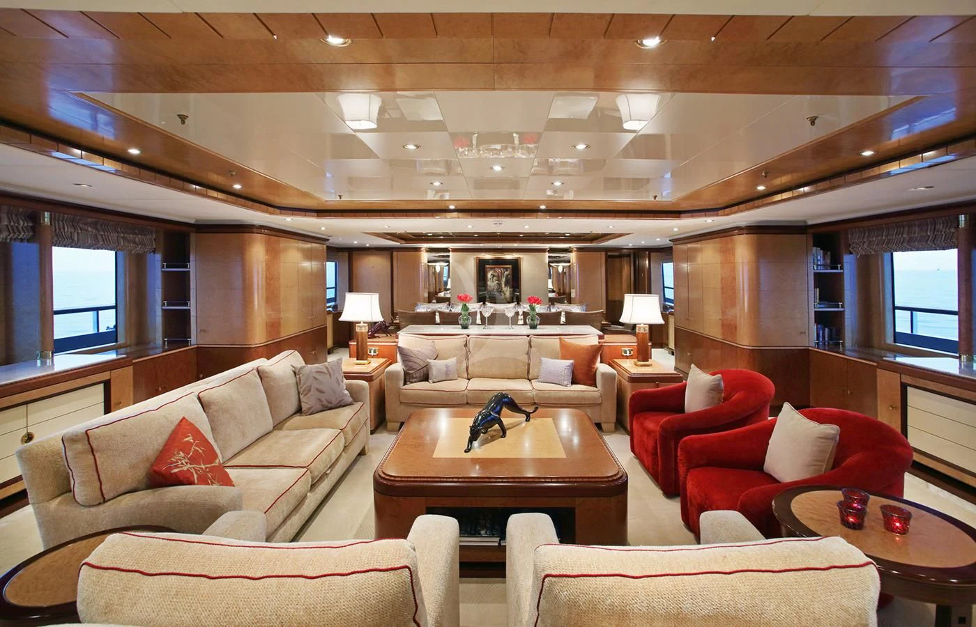 a living room with a large wood ceiling aboard JAGUAR Yacht for Charter