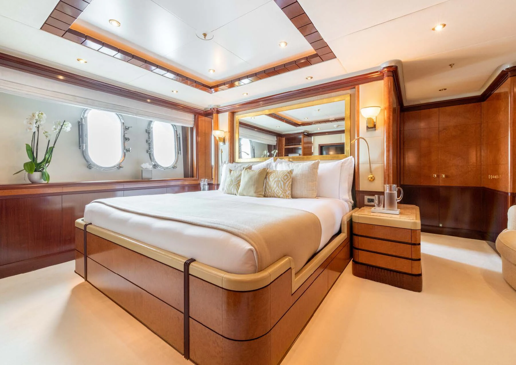 a large bedroom with a large bed aboard JAGUAR Yacht for Charter