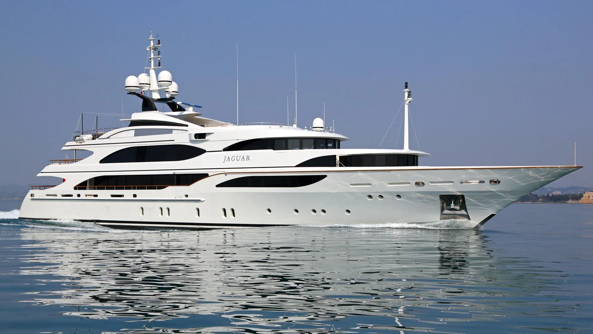 a white yacht on the water aboard JAGUAR Yacht for Charter