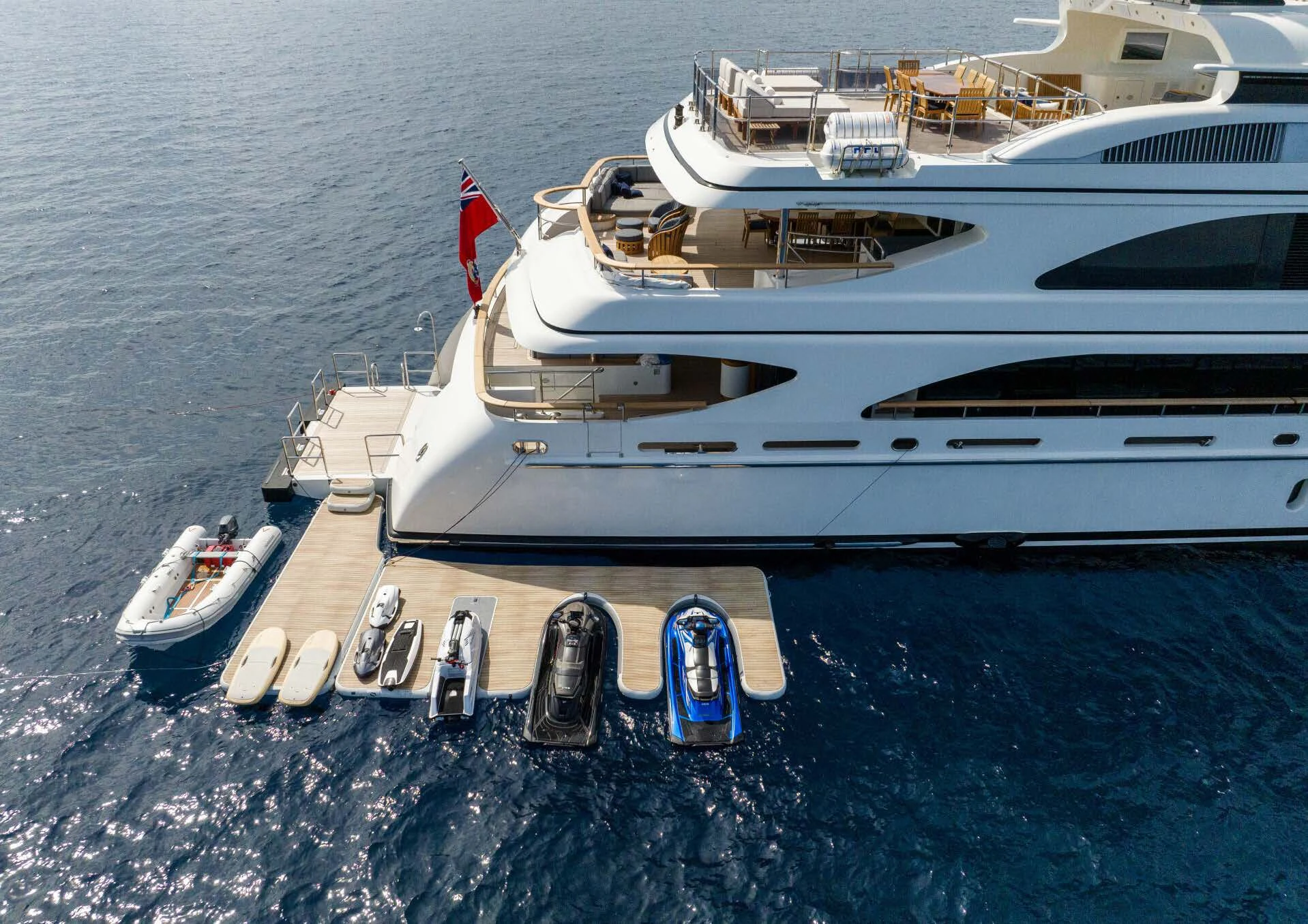 a boat docked at a pier aboard JAGUAR Yacht for Charter