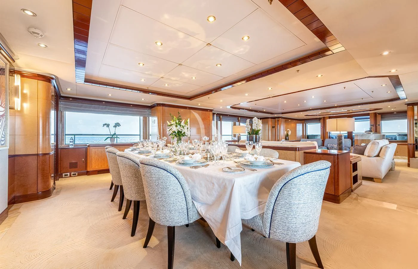 a large dining room with a large table and chairs aboard JAGUAR Yacht for Charter