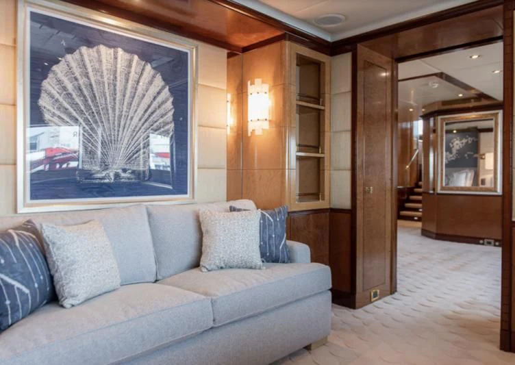 a living room with a large window aboard JAGUAR Yacht for Charter