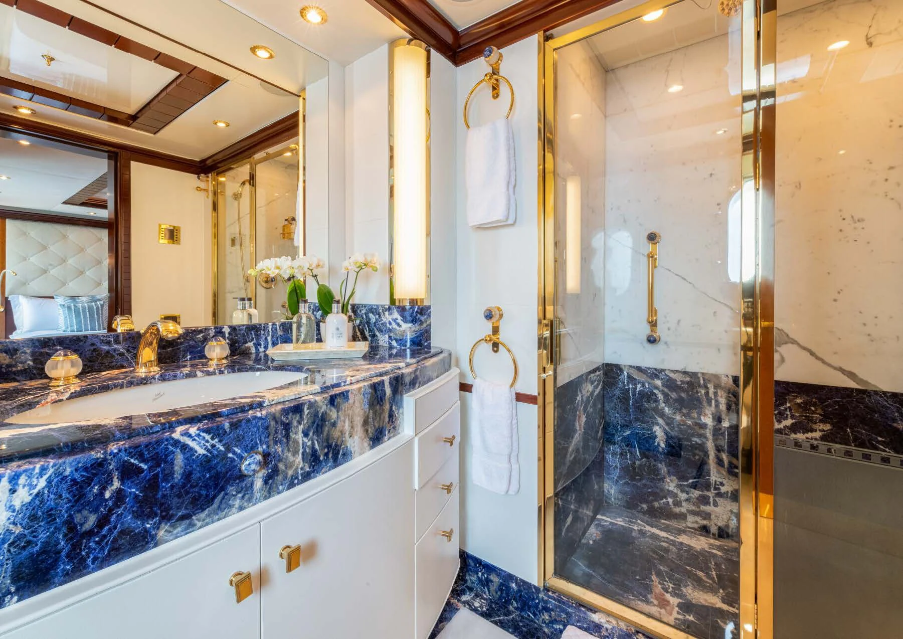 a bathroom with a large marble countertop aboard JAGUAR Yacht for Charter