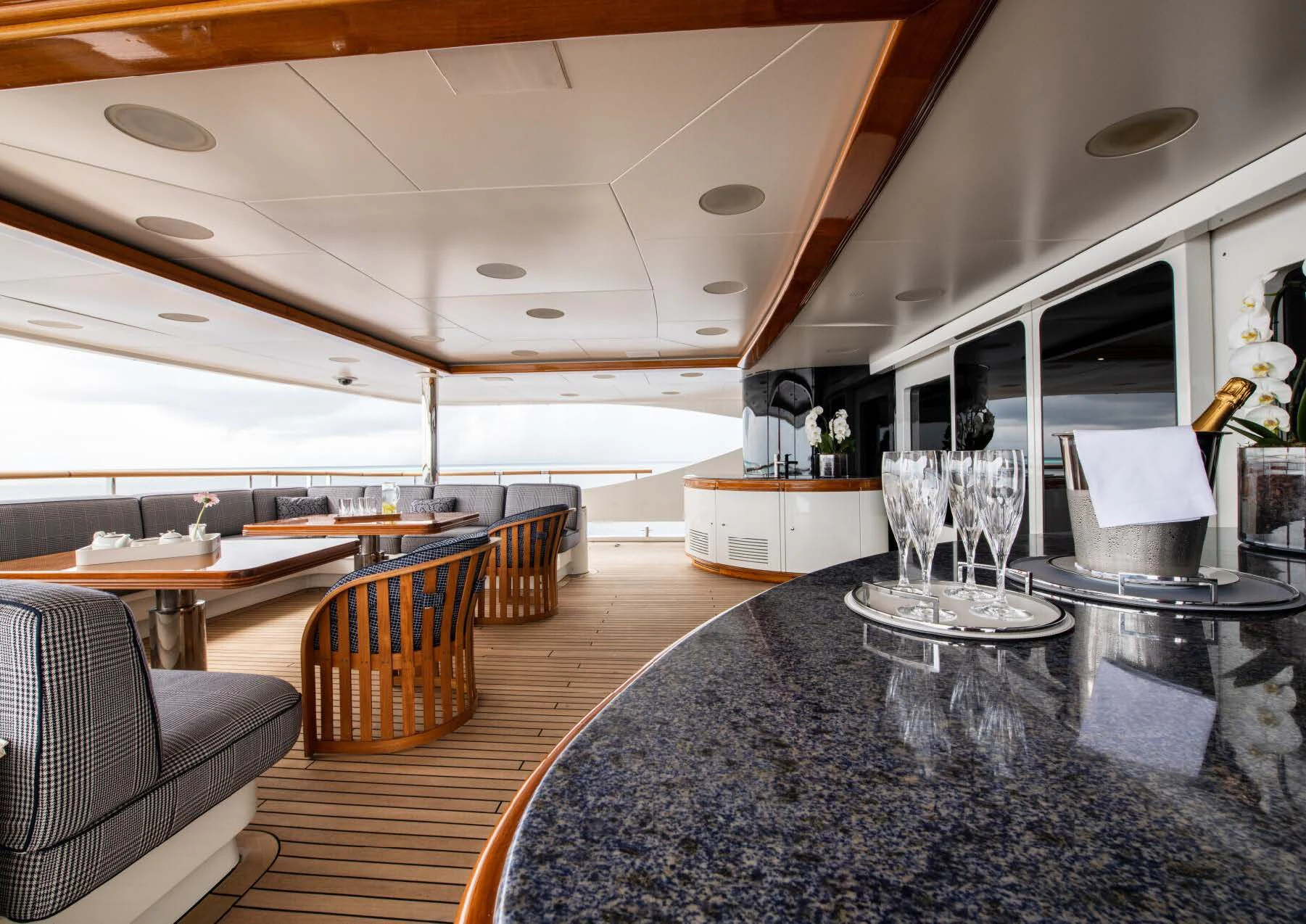 a large room with a table and chairs aboard JAGUAR Yacht for Charter