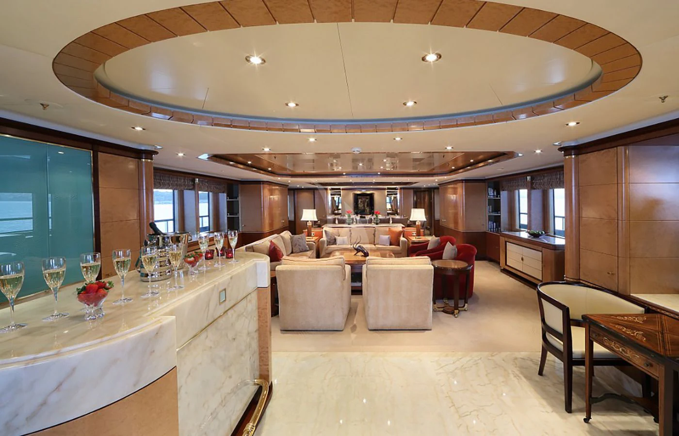 a large room with a table and chairs aboard JAGUAR Yacht for Charter