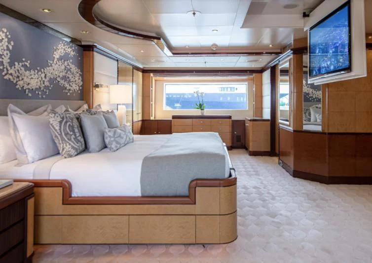 a large bed in a room aboard JAGUAR Yacht for Charter