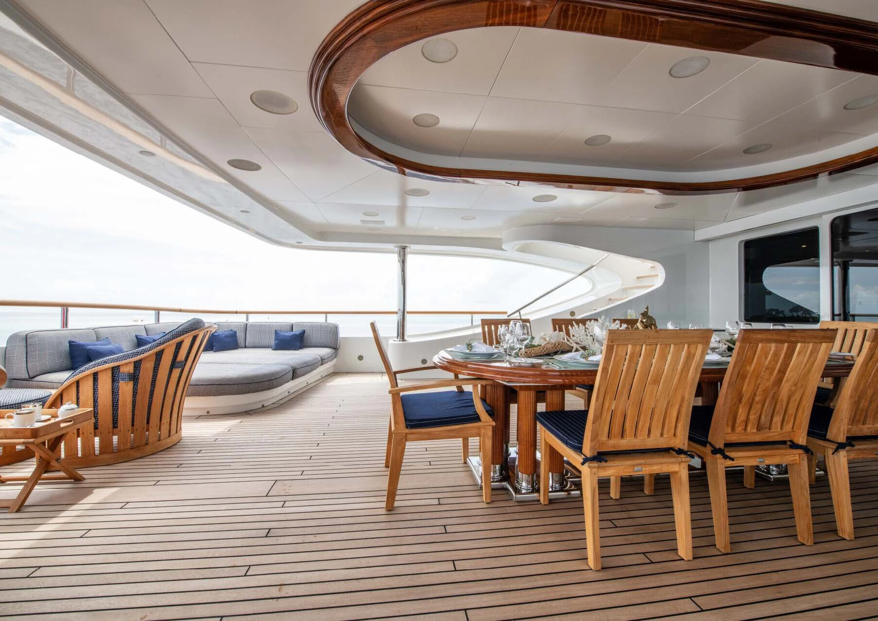 a room with tables and chairs aboard JAGUAR Yacht for Charter