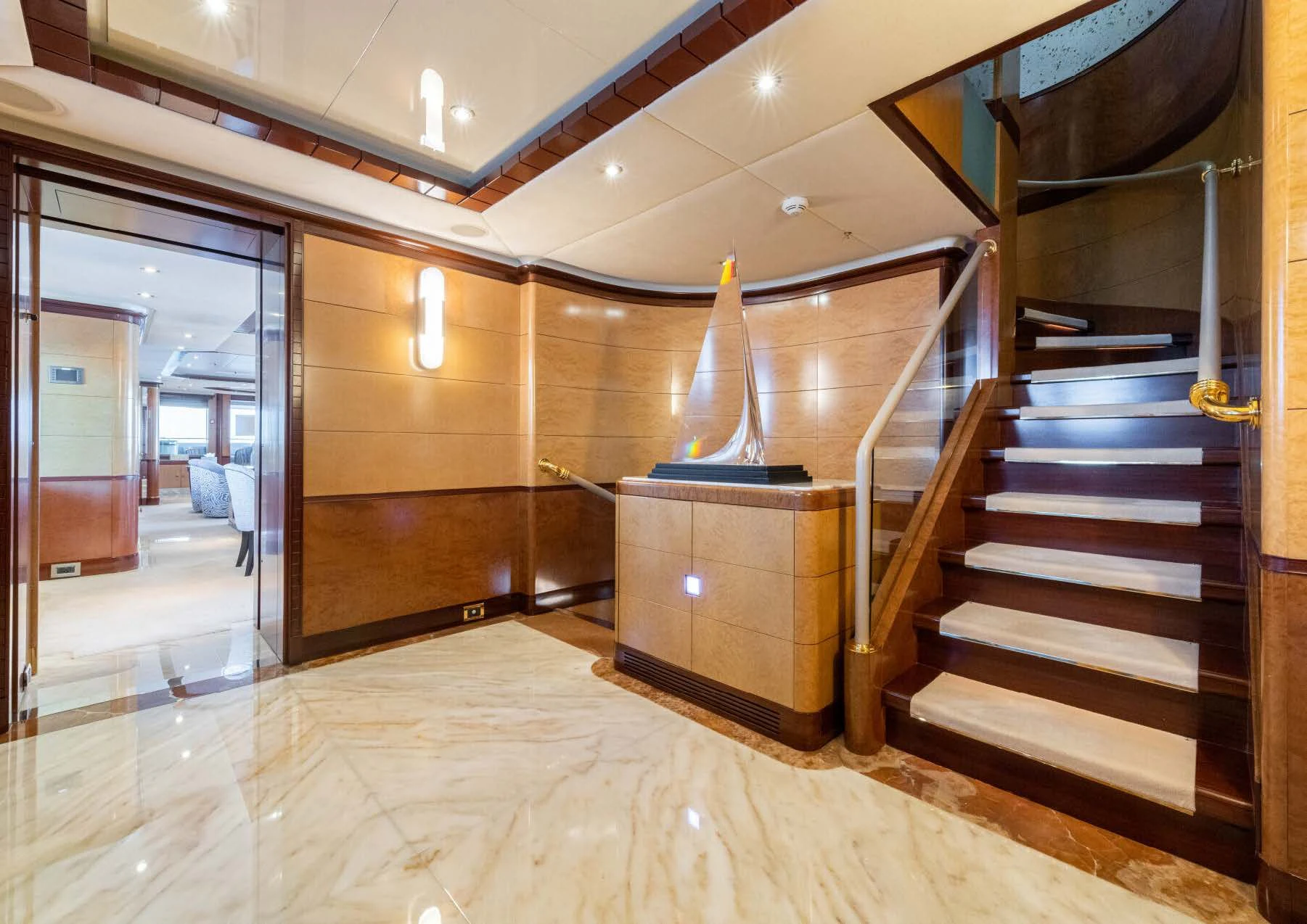 a wooden staircase in a house aboard JAGUAR Yacht for Charter