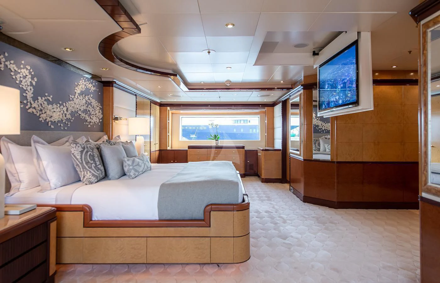 a large bed in a room aboard JAGUAR Yacht for Charter