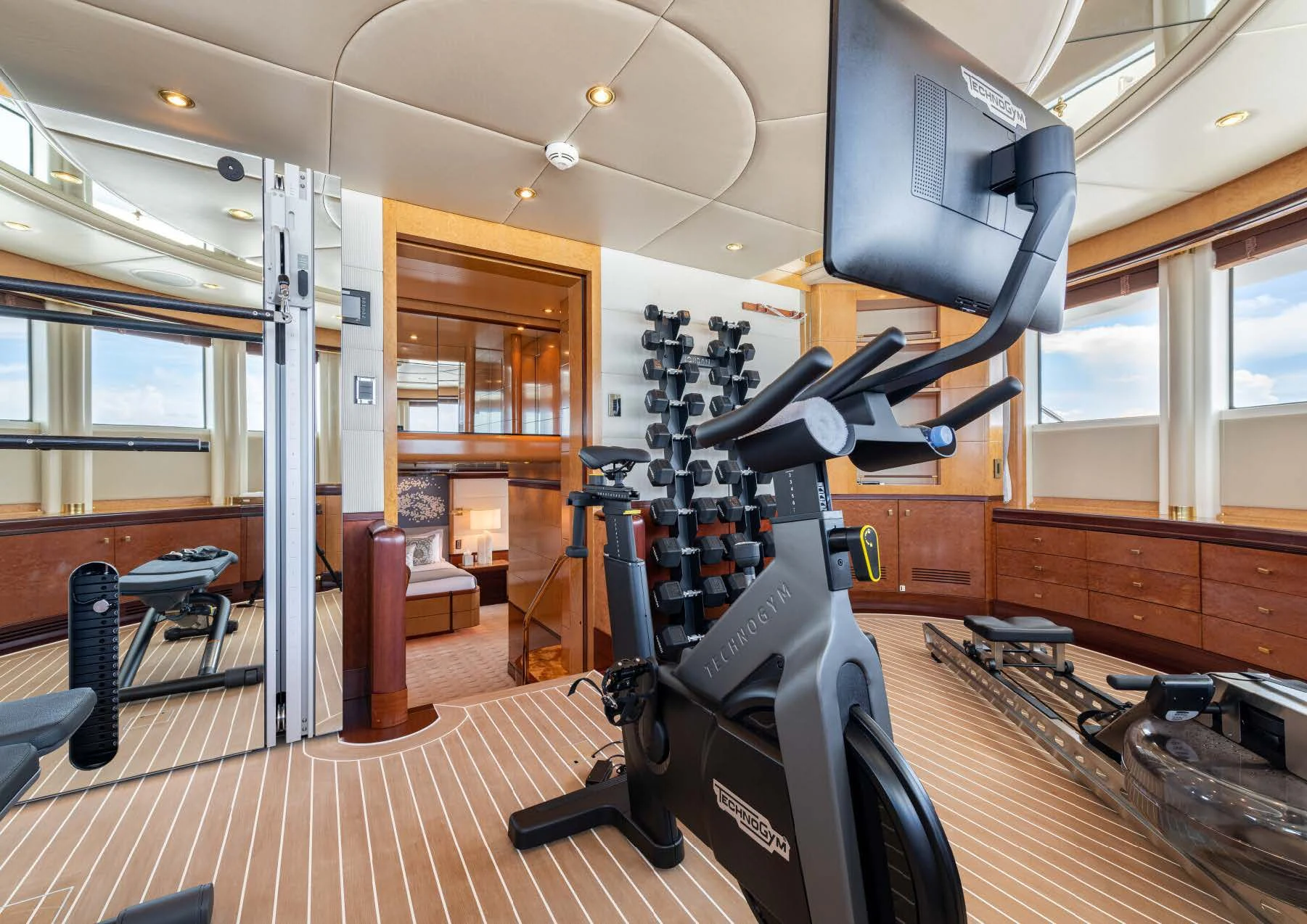 a gym with exercise equipment aboard JAGUAR Yacht for Charter