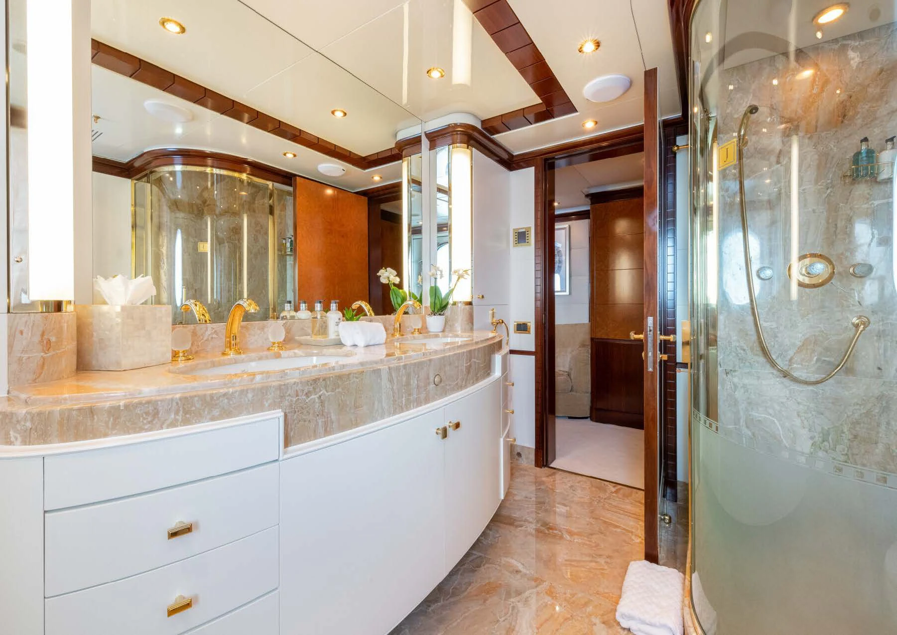 a bathroom with a large glass shower aboard JAGUAR Yacht for Charter