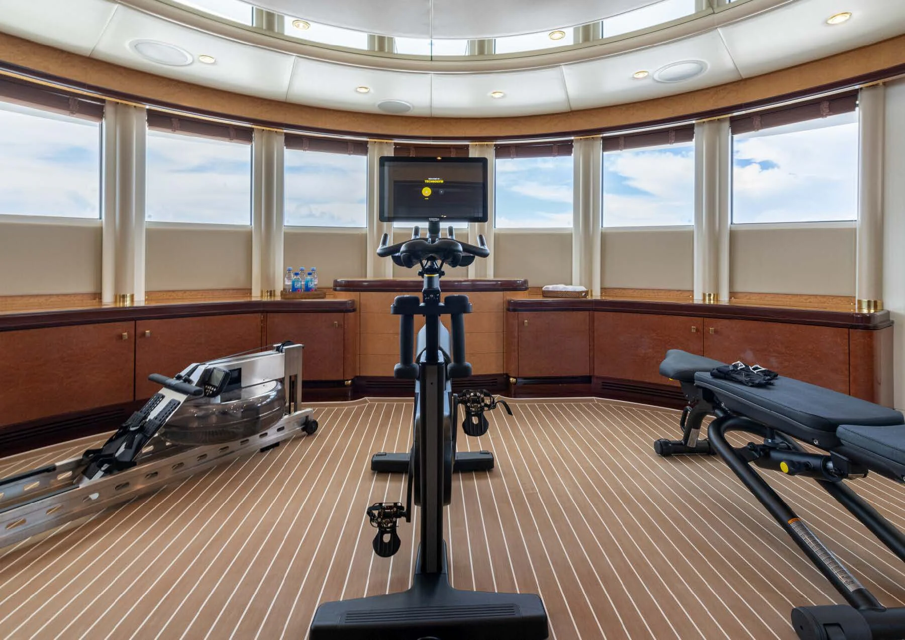 a room with a large mirror and a large window aboard JAGUAR Yacht for Charter