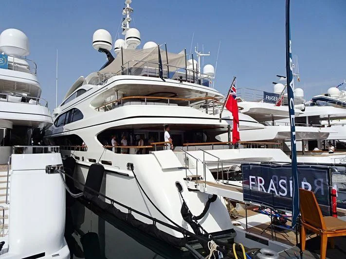 a boat docked with a chair and a chair aboard JAGUAR Yacht for Charter