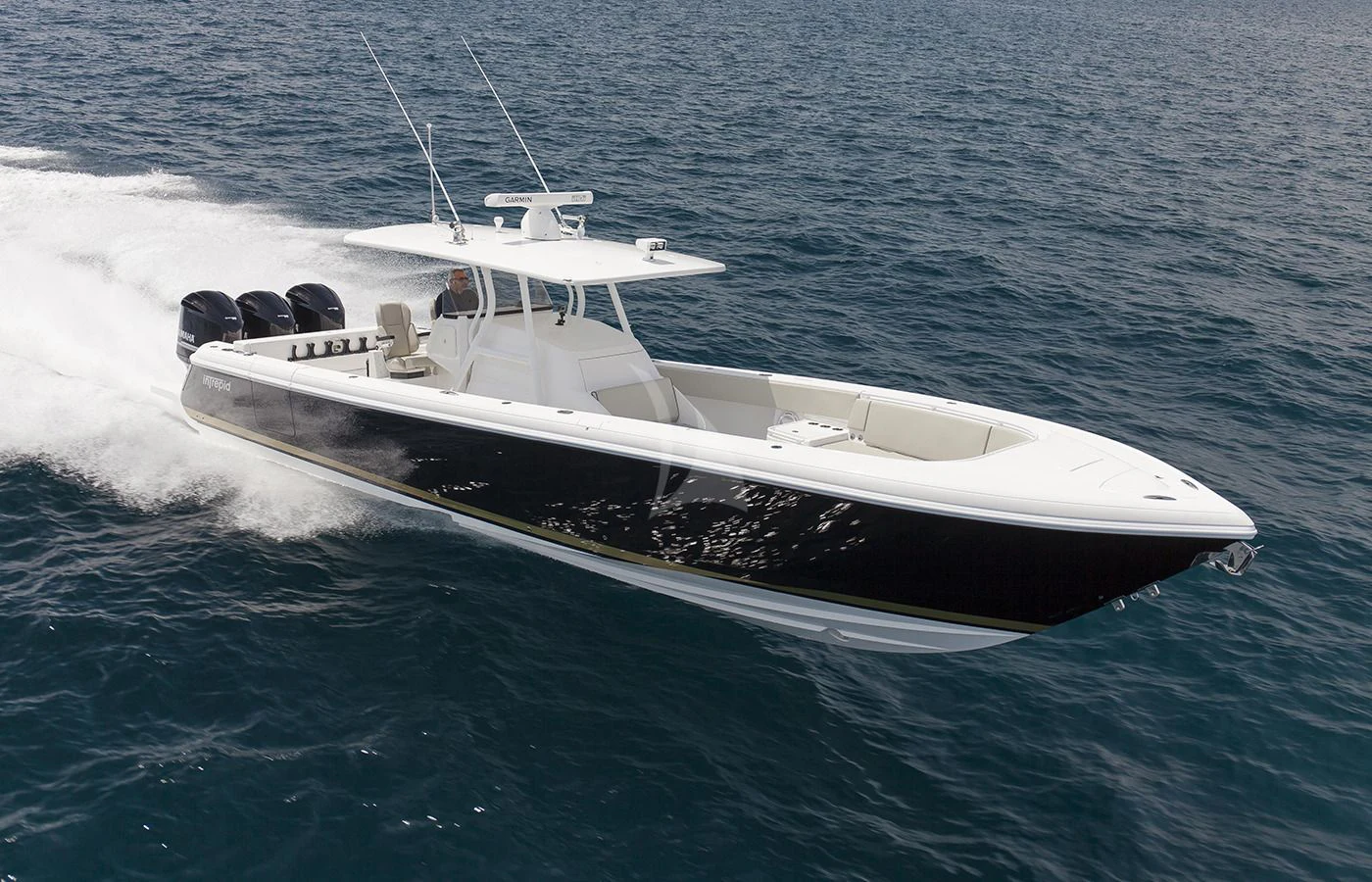 a white boat on the water aboard JAGUAR Yacht for Charter