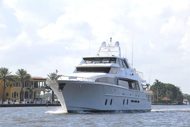 a large white boat on the water aboard LEMONADE Yacht for Sale