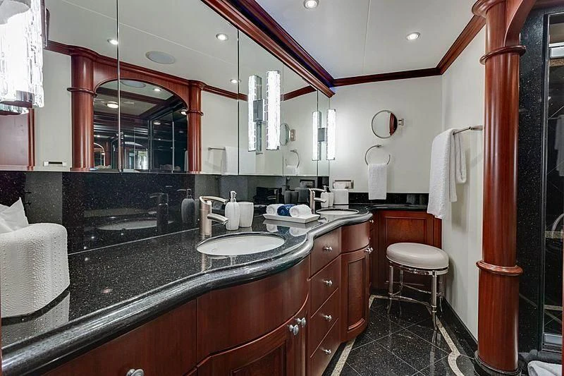 a bathroom with a sink and a mirror aboard LEMONADE Yacht for Sale