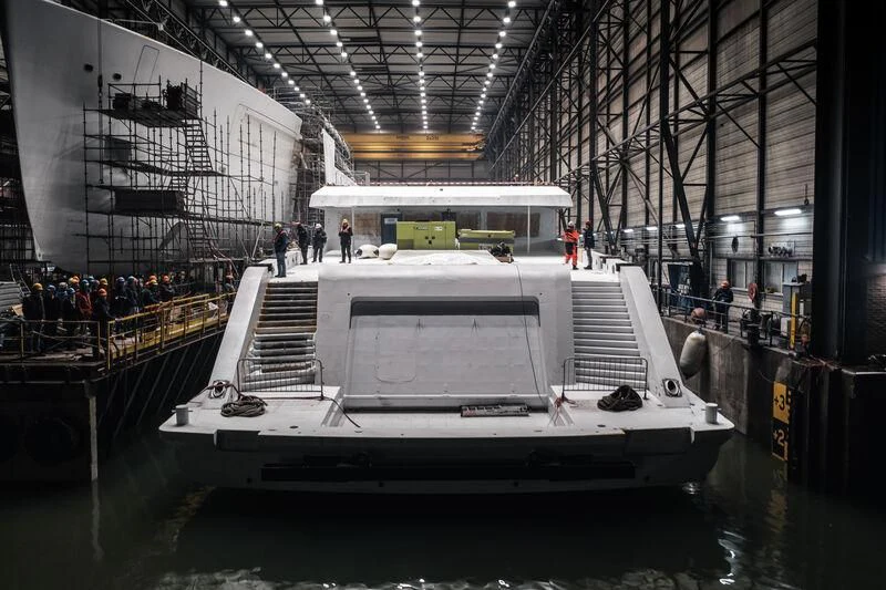 a boat in a large building aboard DRIZZLE Yacht for Sale