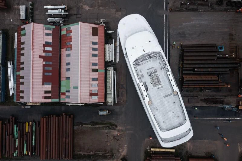a large building with many windows aboard DRIZZLE Yacht for Sale
