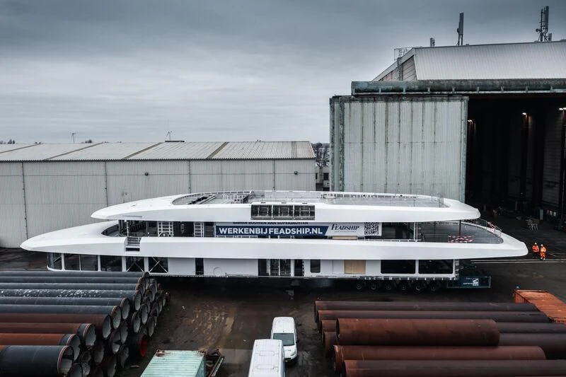 a large white passenger bus aboard DRIZZLE Yacht for Sale