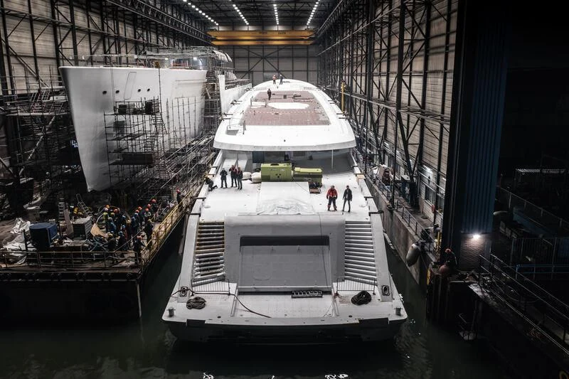 a large ship docked in a large building aboard DRIZZLE Yacht for Sale