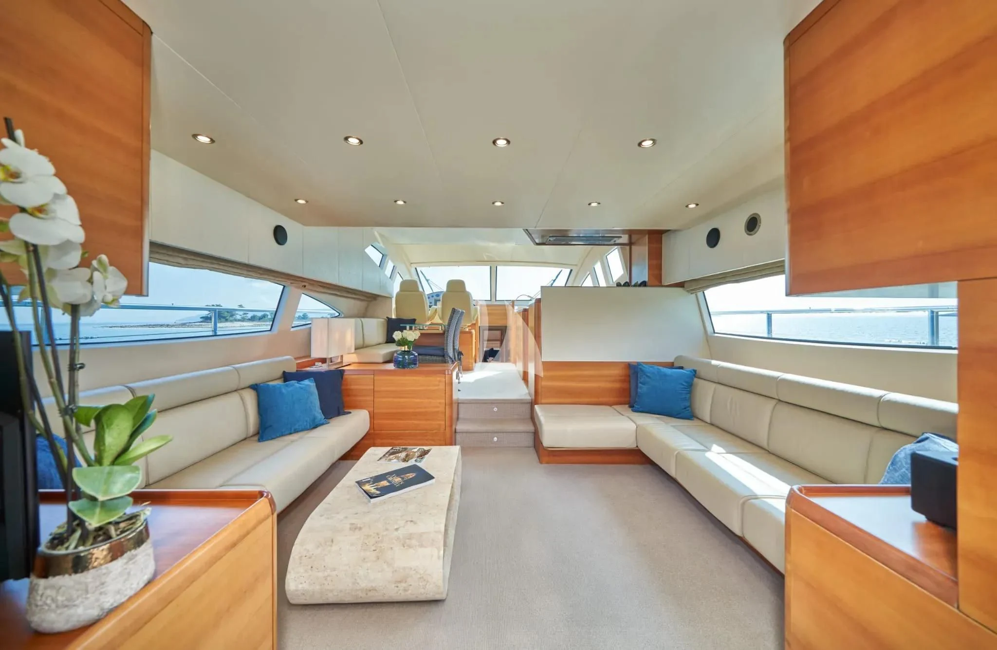 a room with a couch and a table aboard W Yacht for Sale