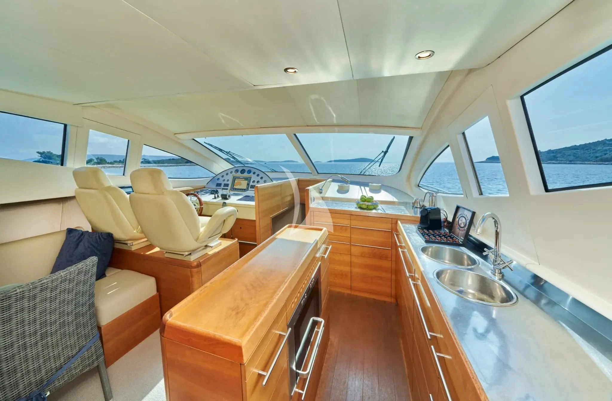 a kitchen and living room aboard W Yacht for Sale