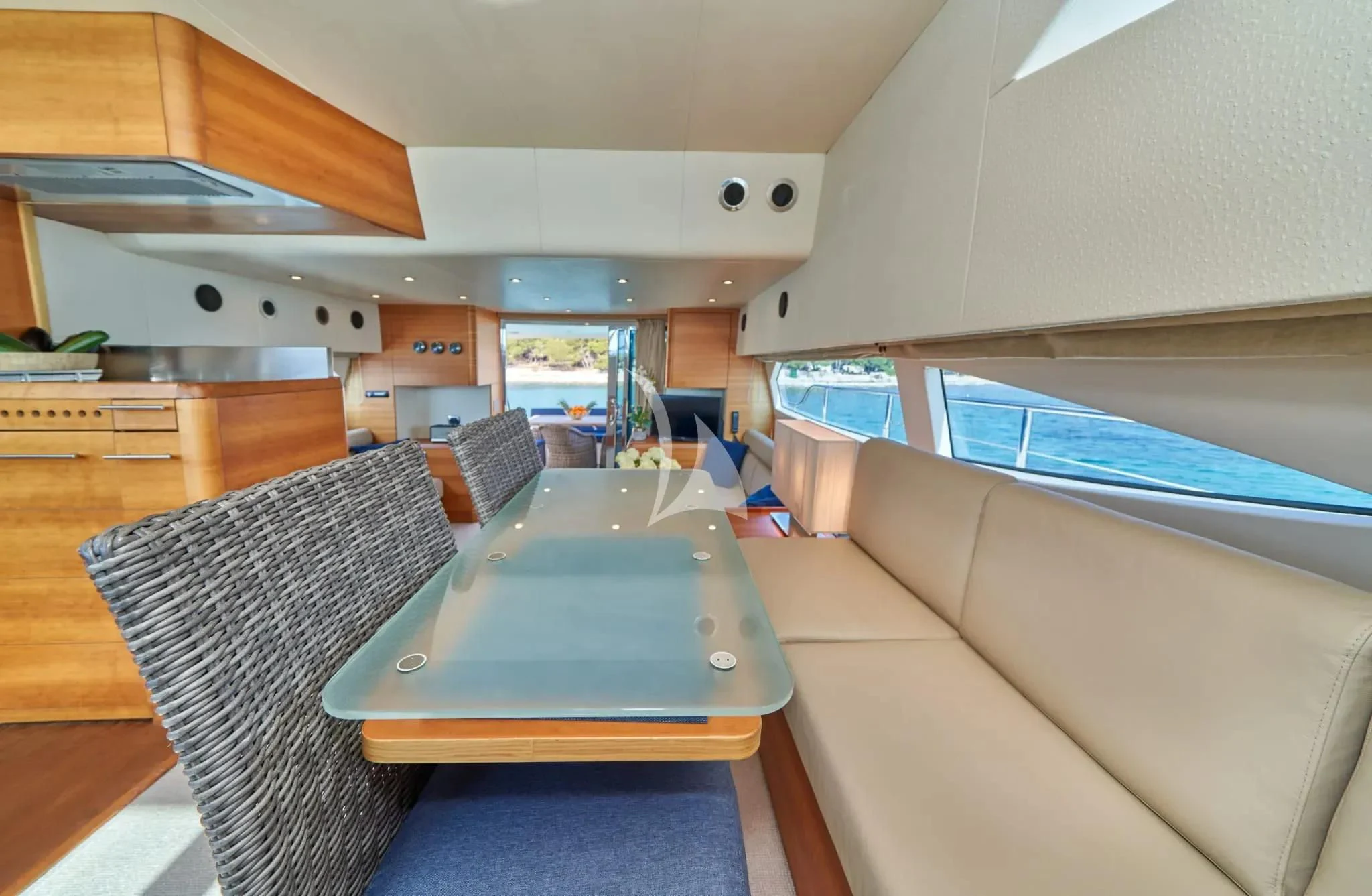 a room with a table and chairs aboard W Yacht for Sale