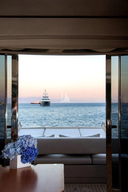 a view of a boat on the water from a balcony aboard W Yacht for Sale