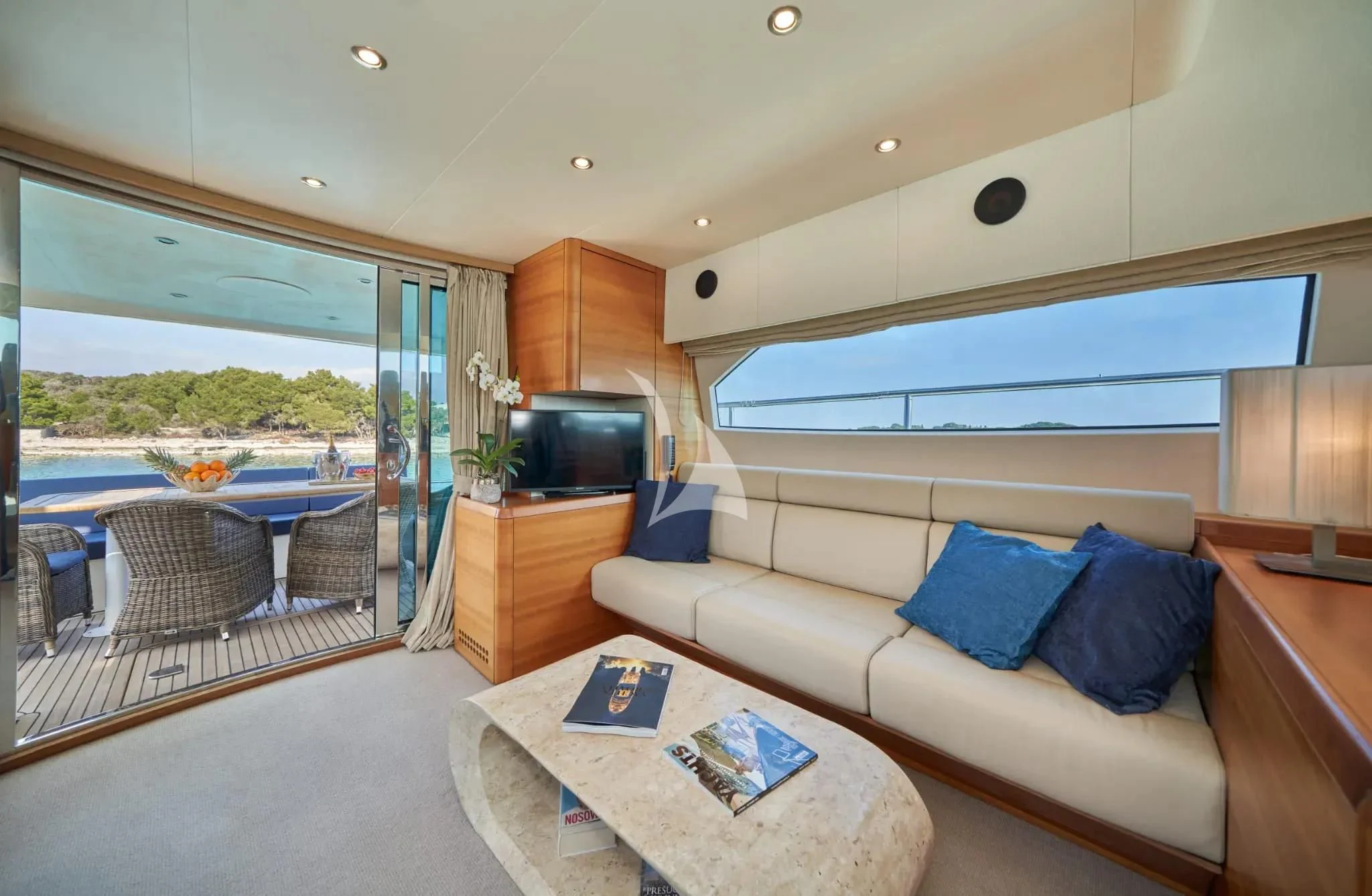 a living room with a large window aboard W Yacht for Sale