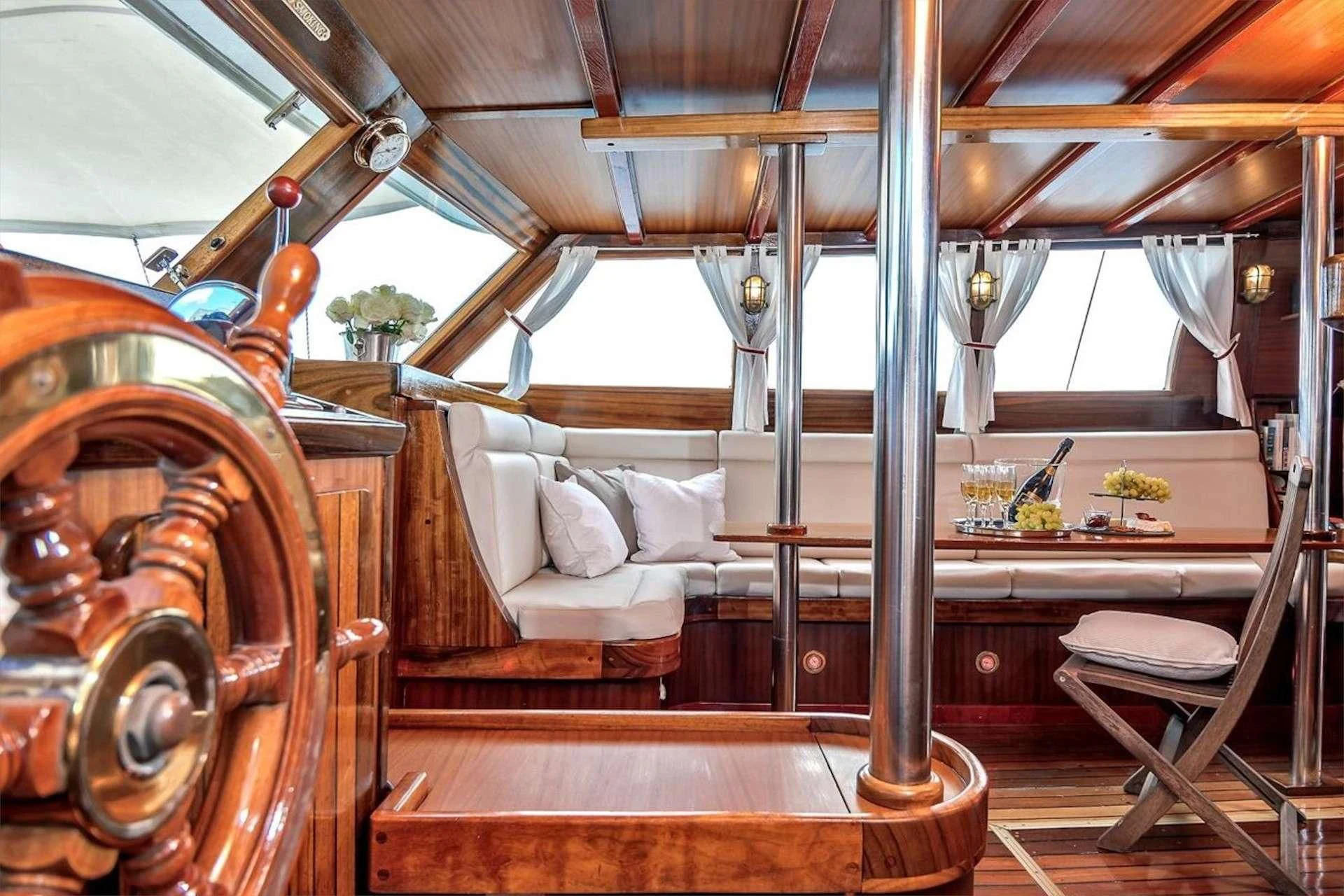 a room with a bed and a chair aboard W Yacht for Sale