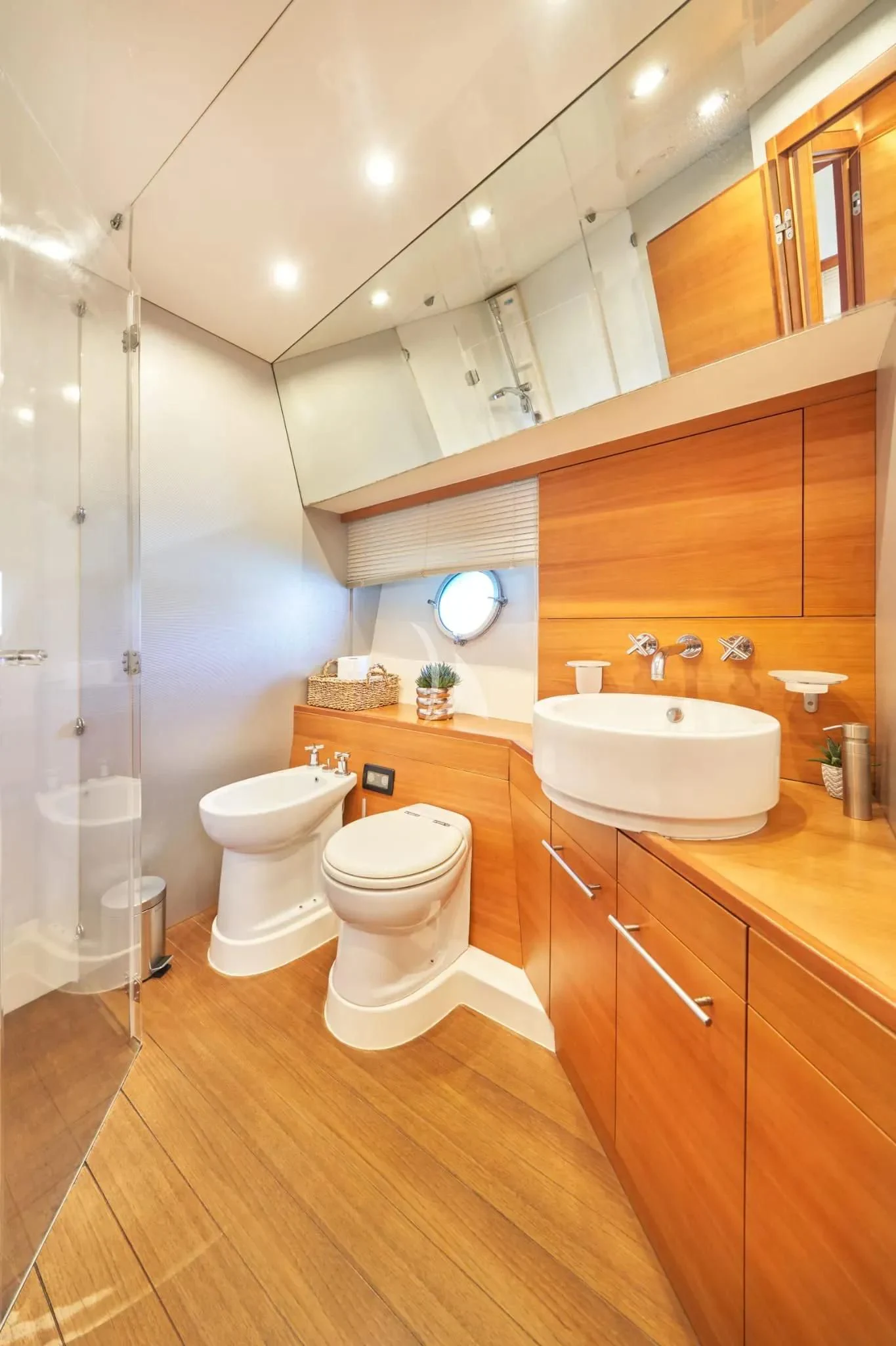 a bathroom with a sink toilet and a shower aboard W Yacht for Sale