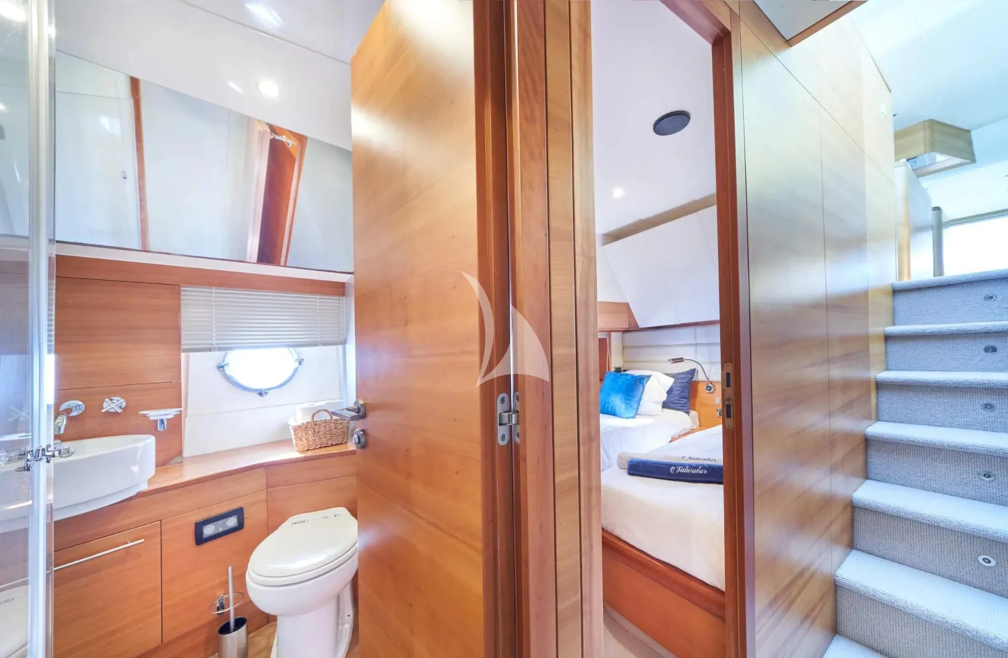 a bathroom with a toilet and a sink aboard W Yacht for Sale