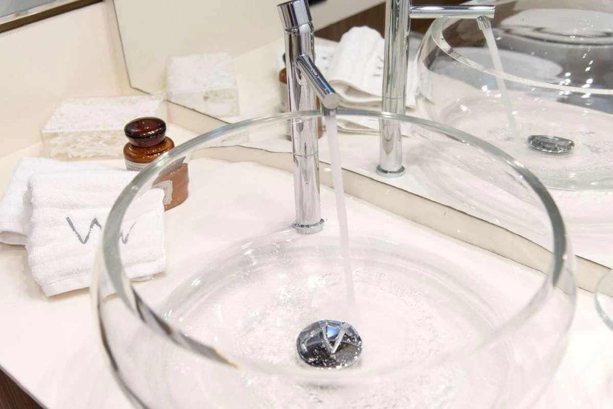 a sink with a faucet aboard W Yacht for Sale