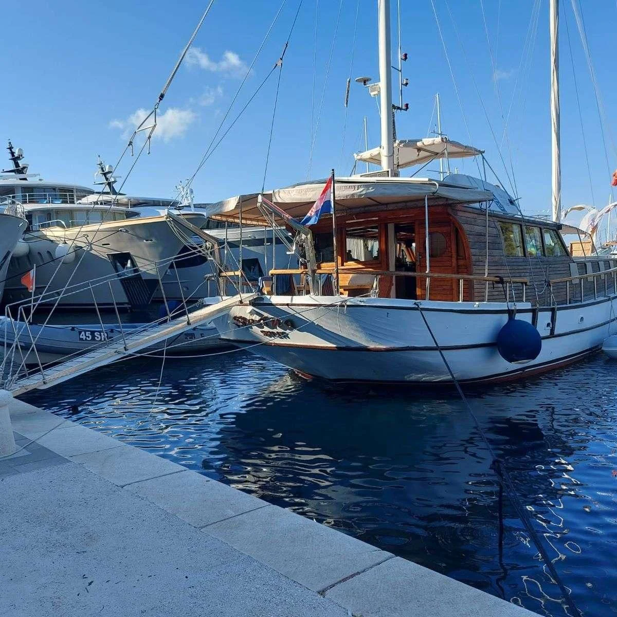 a group of boats are parked in the water aboard W Yacht for Sale
