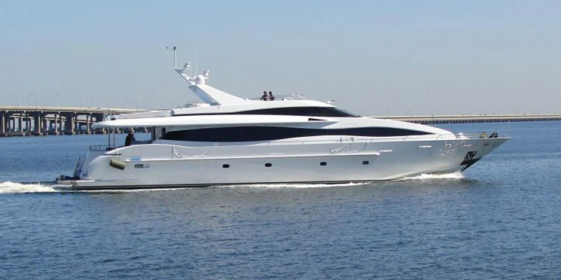 a white yacht on the water aboard IDLETYME II Yacht for Sale