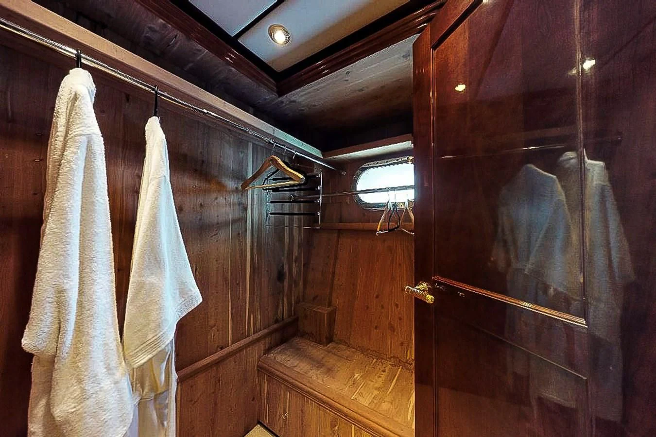 a room with a curtain and a window aboard IDLETYME II Yacht for Sale