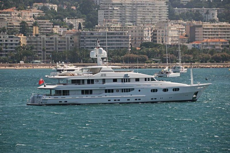 a large white boat in the water aboard TALES Yacht for Sale