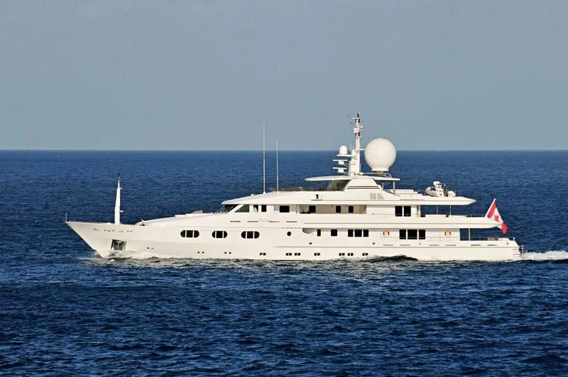 a large white boat in the water aboard TALES Yacht for Sale