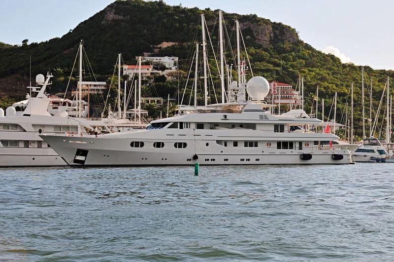 a large white boat in the water aboard TALES Yacht for Sale
