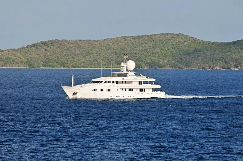 a white boat on the water aboard TALES Yacht for Sale