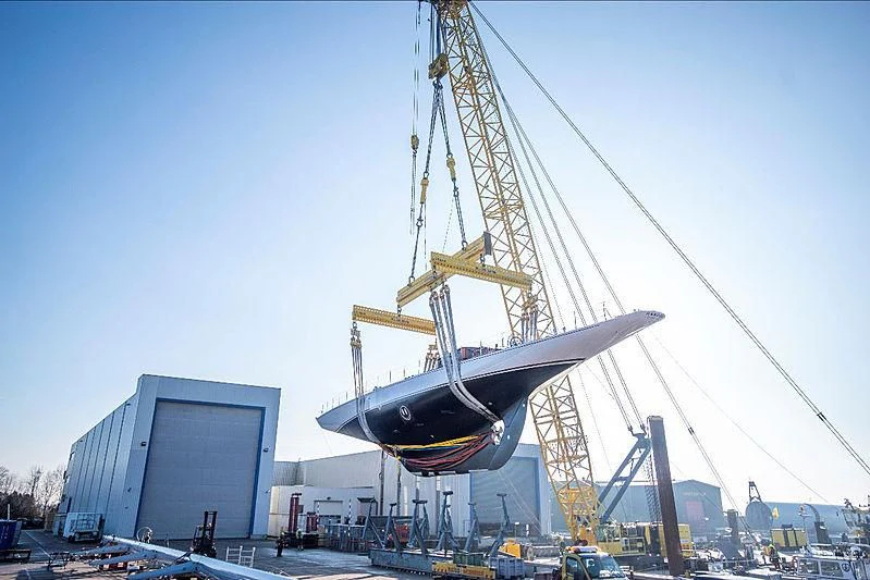 a large crane with a building in the background aboard RANGER Yacht for Sale
