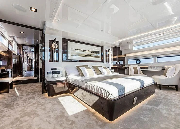 a large bedroom with a large bed aboard THETIS Yacht for Sale