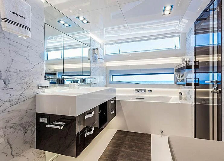 a room with a counter and cabinets aboard THETIS Yacht for Sale