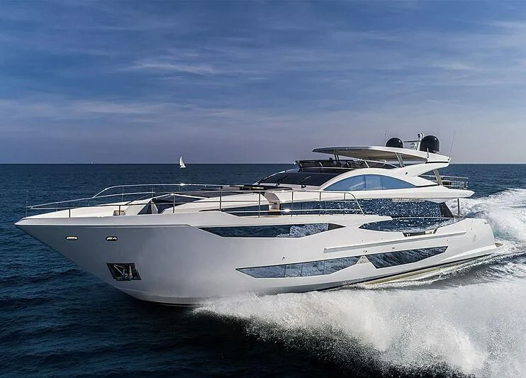 a white yacht on the water aboard THETIS Yacht for Sale