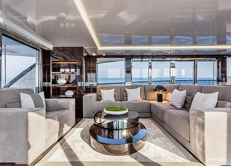 a living room with a large window aboard THETIS Yacht for Sale