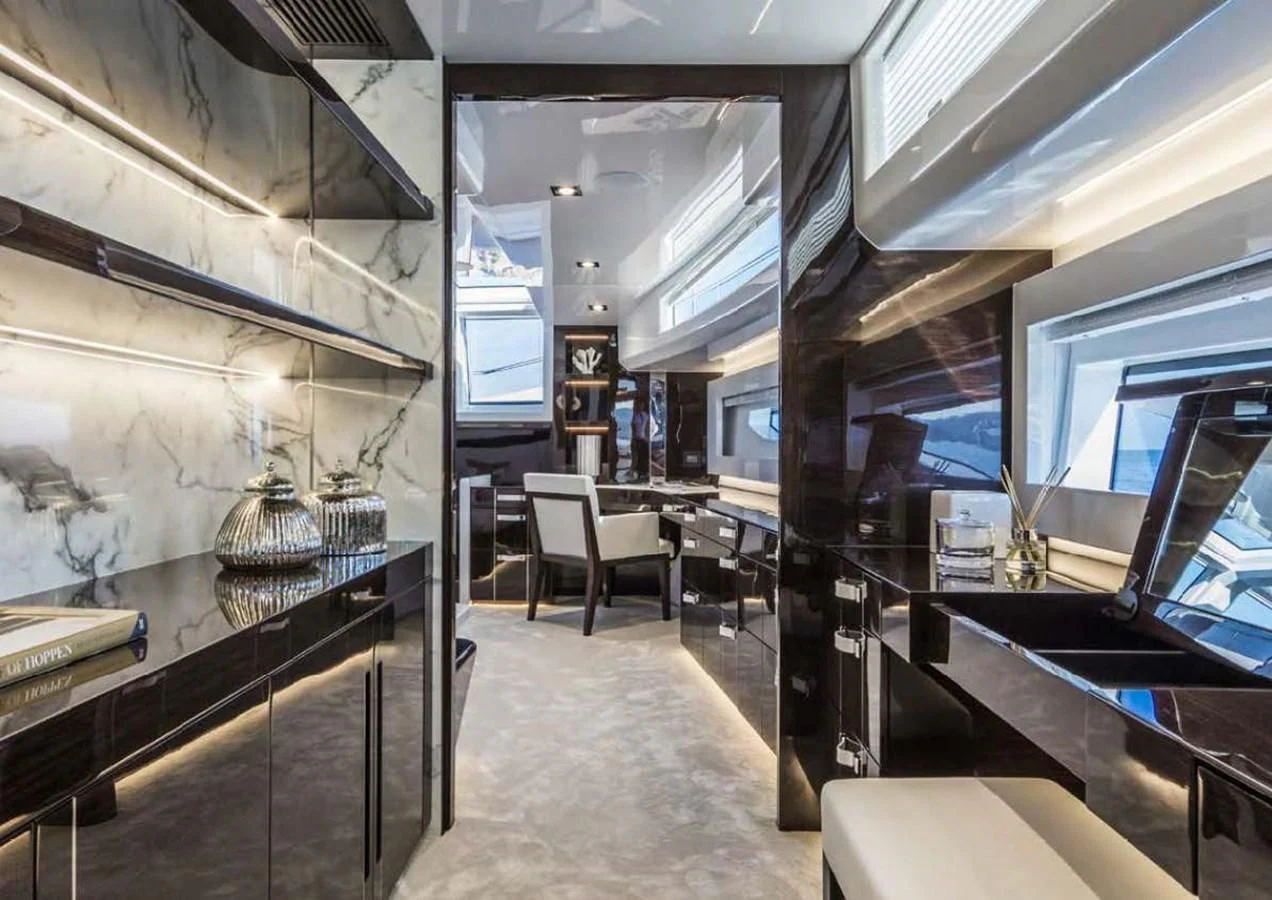 a room with a table and chairs aboard THETIS Yacht for Sale