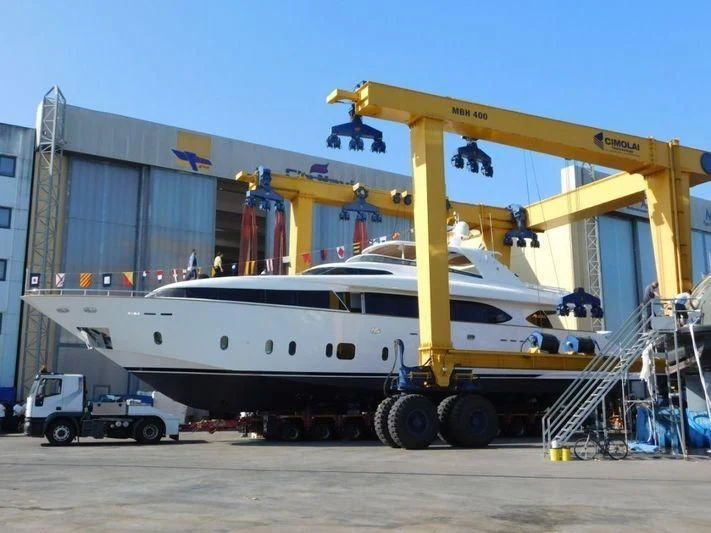 a large white boat with a crane aboard MICHELA Yacht for Sale