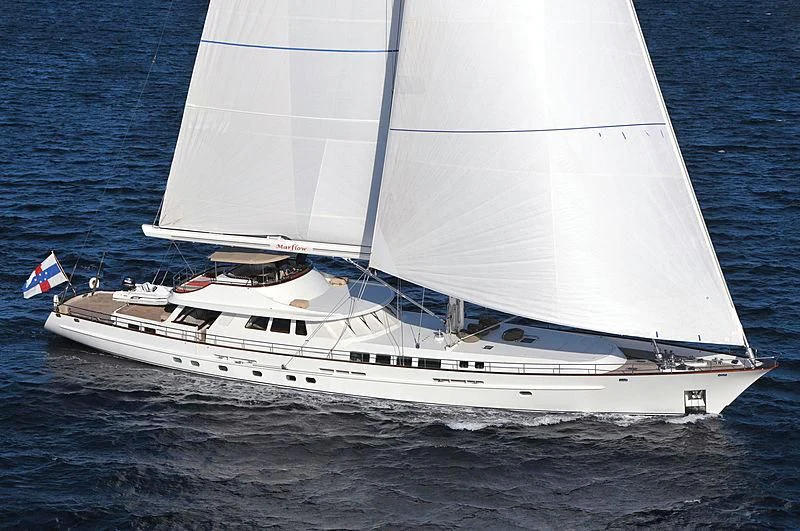 a white yacht on the water aboard AVENTURA Yacht for Sale